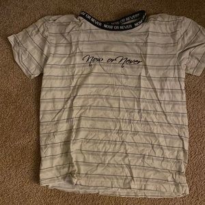 size small packing shirt "now or never" colors tan cream and brown